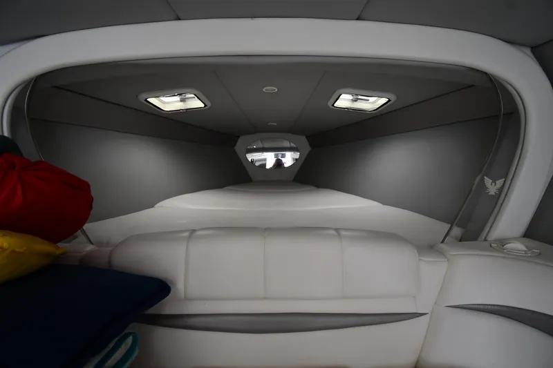 Slide: The Image of 2003 Formula 353 FASTech cabin interior with white seating and overhead lighting. - 26