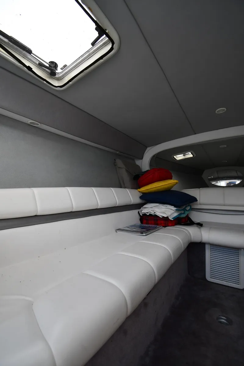 Slide: The Image of 2003 Formula 353 FASTech cabin interior with white seating and overhead hatch. - 33