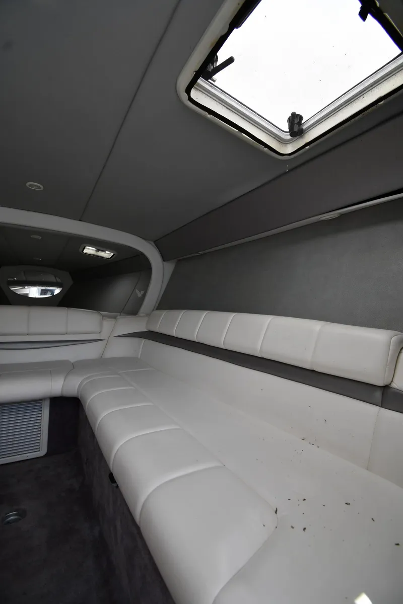 Slide: The Image of 2003 Formula 353 FASTech interior with white seating and overhead hatch. - 34