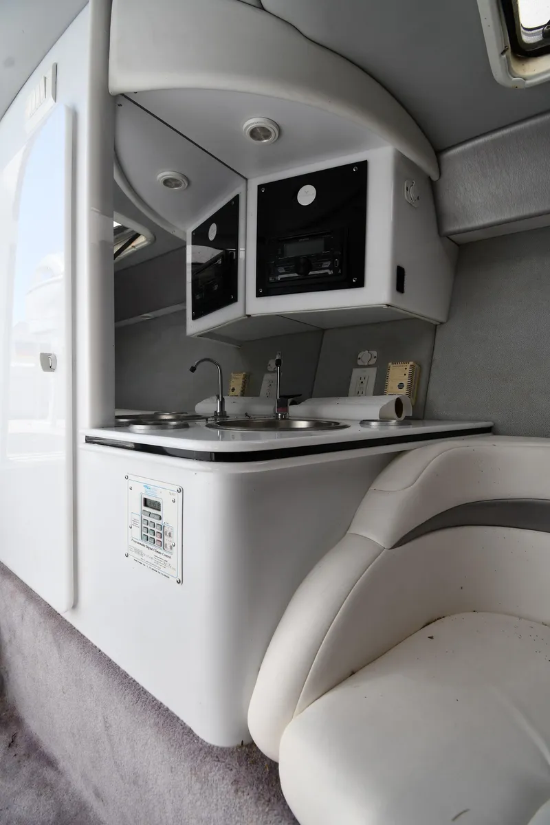 Slide: The Image of 2003 Formula 353 FASTech boat interior with kitchenette and seating area. - 39