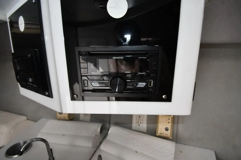 Slide: The Image of 2003 Formula 353 FASTech boat interior with Kenwood stereo system. - 40