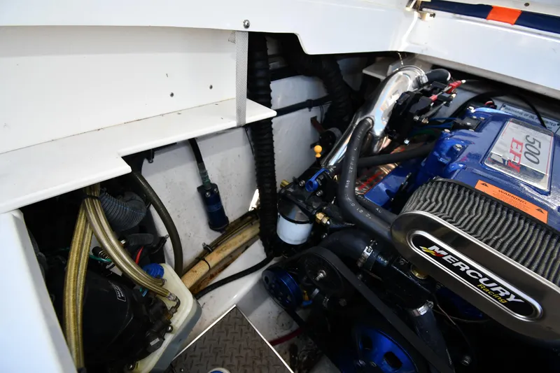 Slide: The Image of 2003 Formula 353 FASTech engine compartment with Mercury engine components. - 49