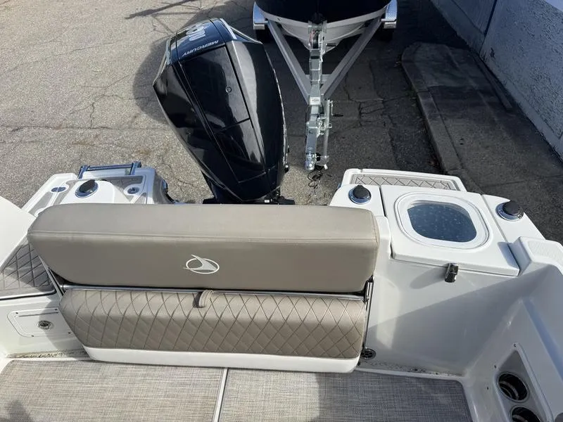 Slide: The Image of 2021 Finseeker 200 CC boat with outboard motor and cushioned seating. - 19