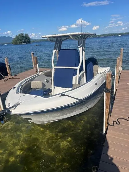 Slide: The Image of 2021 Finseeker 200 CC boat docked on a sunny lake. - 3
