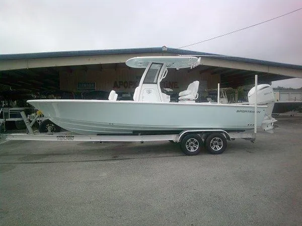 Slide: The Image of 2025 Sportsman 267 Masters boat on trailer, parked outdoors. - 1