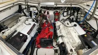 Slide: The Image of Engine room of 2000 Pursuit 3400 Express with dual engines. - 12