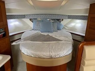 Slide: The Image of Interior of 2000 Pursuit 3400 Express with cozy bed. - 14