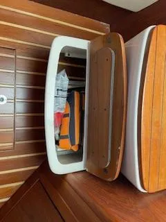 Slide: The Image of Interior of 2000 Pursuit 3400 Express with storage compartment. - 17