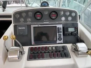 Slide: The Image of Dashboard of a 2000 Pursuit 3400 Express boat. - 3