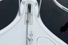 Slide: The Image of Bow of a 2000 Pursuit 3400 Express boat with anchor chain. - 9