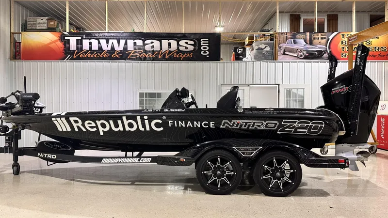 Slide: The Image of 2023 Nitro Z20 Pro boat with Republic Finance branding in showroom. - 5