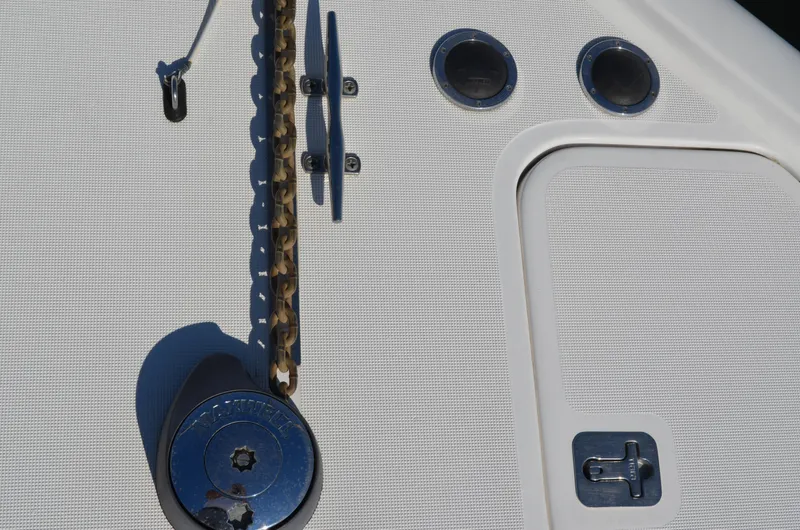 Slide: The Image of Close-up of 2004 Tiara Yachts 3800 Open deck with anchor chain and fittings. - 16