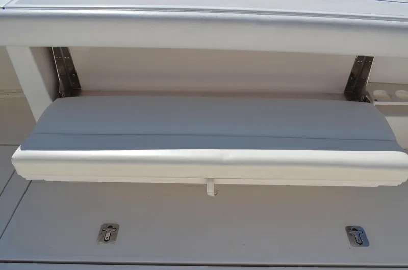 Slide: The Image of Tiara Yachts 3800 Open 2004, white cushioned bench seat detail. - 20