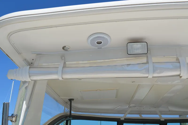 Slide: The Image of Tiara Yachts 3800 Open 2004 boat canopy with speaker and light fixtures. - 30