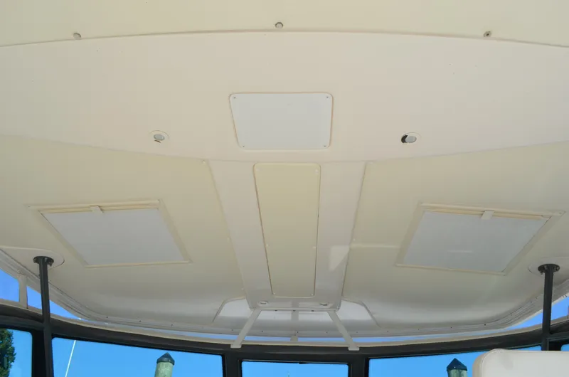 Slide: The Image of Ceiling view of 2004 Tiara Yachts 3800 Open boat interior. - 32