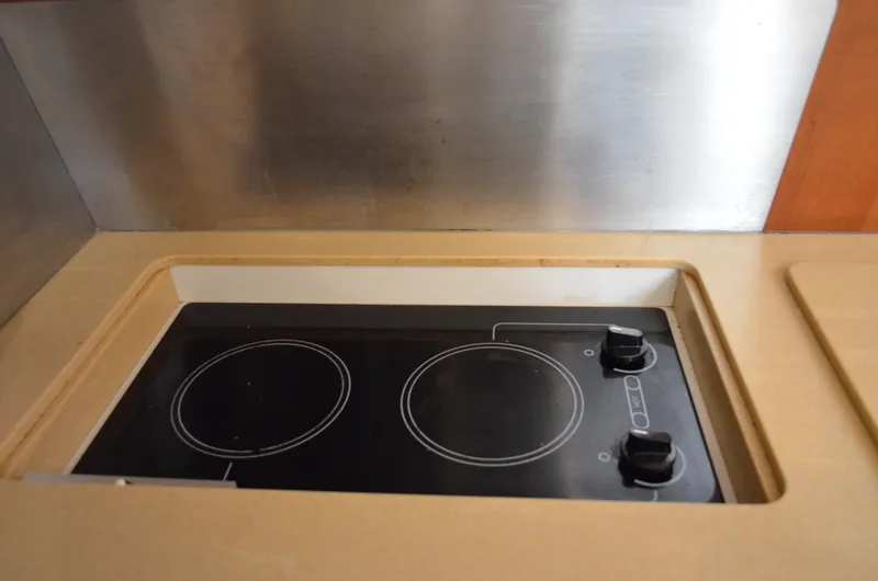 Slide: The Image of 2004 Tiara Yachts 3800 Open kitchen stove with two burners. - 48