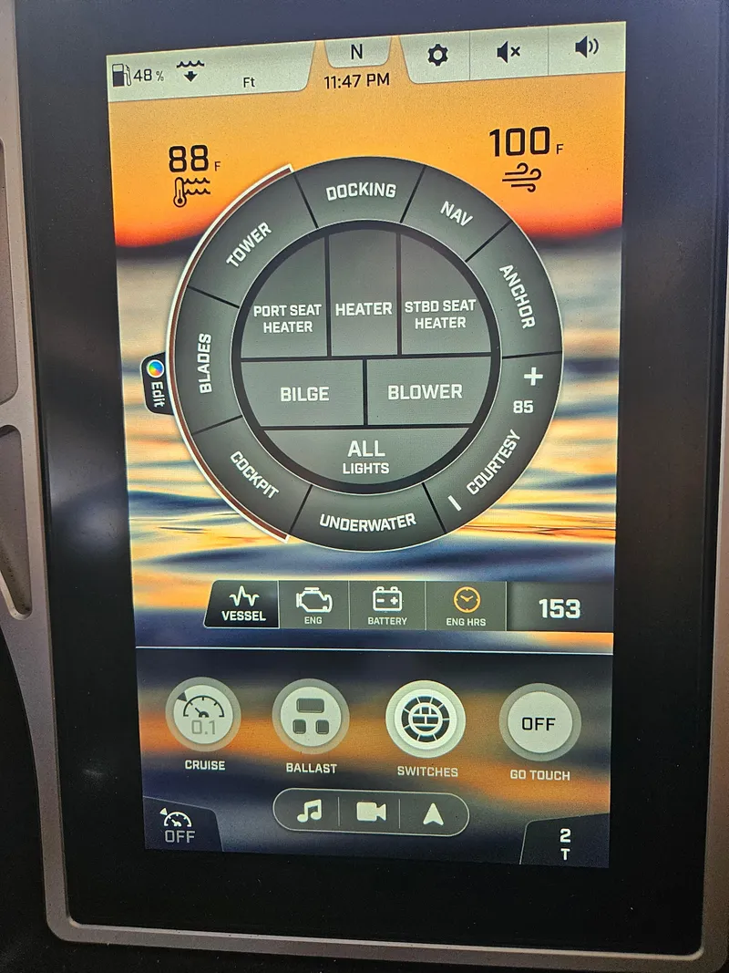 Slide: The Image of 2020 Tigé 25ZX touchscreen control panel displaying temperature and boat settings. - 29