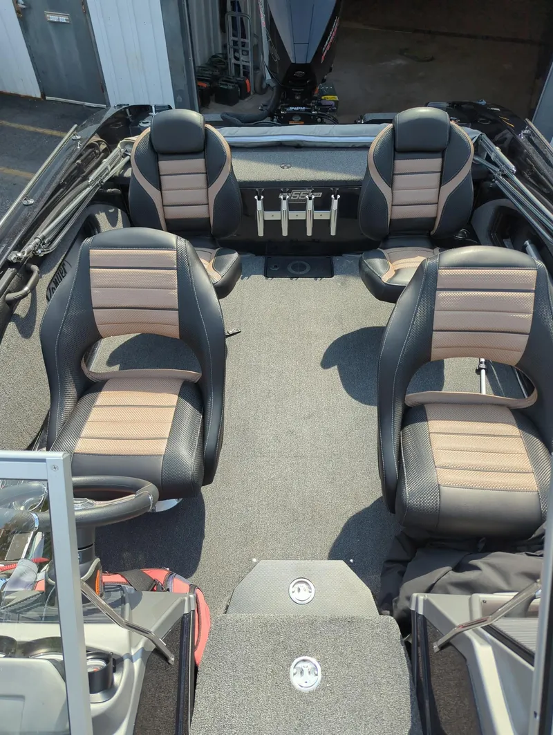 Slide: The Image of 2023 Ranger 2080MS boat interior with four cushioned seats and sleek design. - 10
