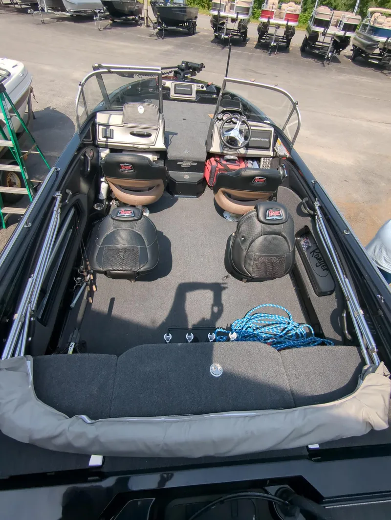 Slide: The Image of 2023 Ranger 2080MS boat interior with seating, steering console, and equipment. - 7