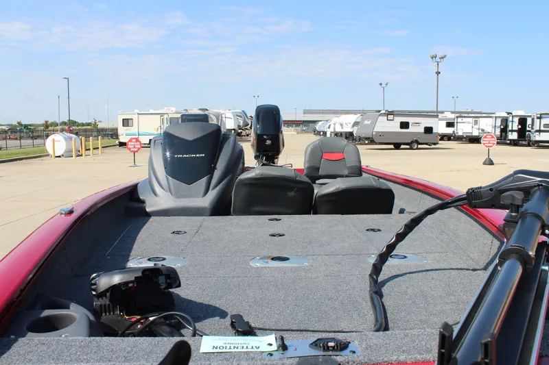 Slide: The Image of 2025 Tracker Pro Team 175 Crappie Edition boat in parking lot, showcasing interior layout. - 16