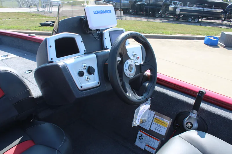 Slide: The Image of 2025 Tracker Pro Team 175 Crappie Edition boat dashboard with Lowrance electronics. - 18