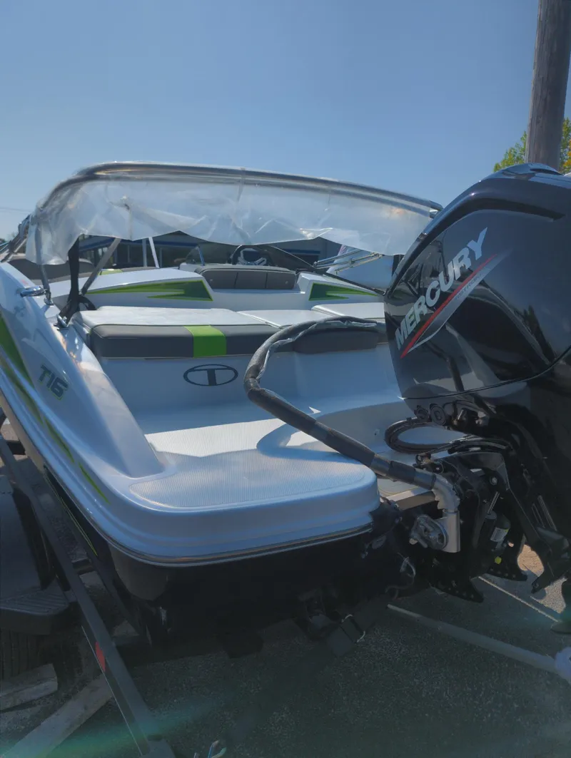 Slide: The Image of 2024 Tahoe T16 boat with Mercury outboard motor on trailer. - 5