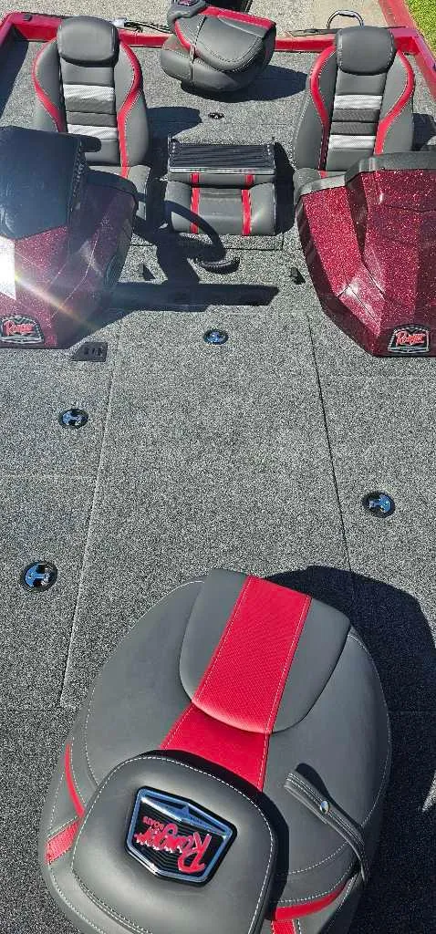 Slide: The Image of 2024 Ranger RT188P boat interior with red and gray seating. - 4