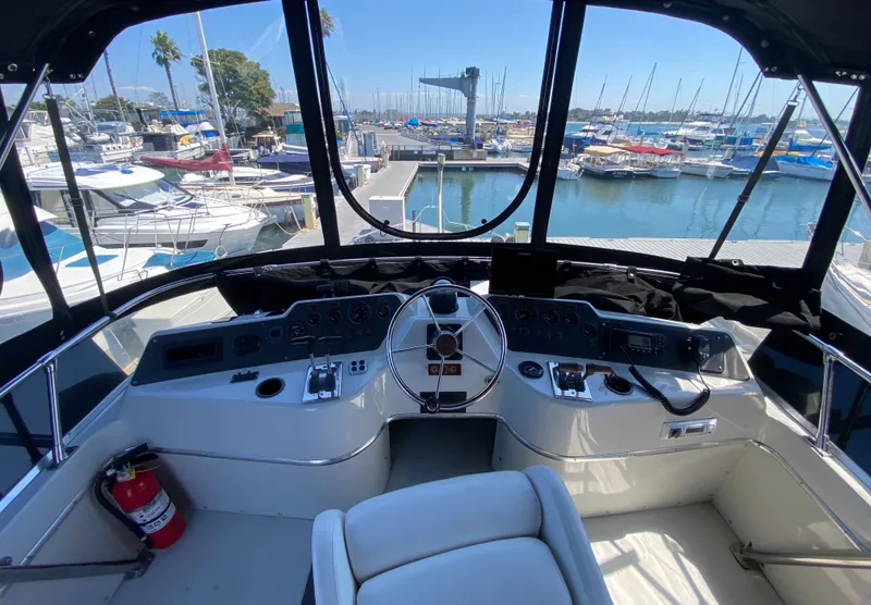 Slide: The Image of Cockpit view of 1988 Chris-Craft 320 Amerosport Sedan at marina. - 32