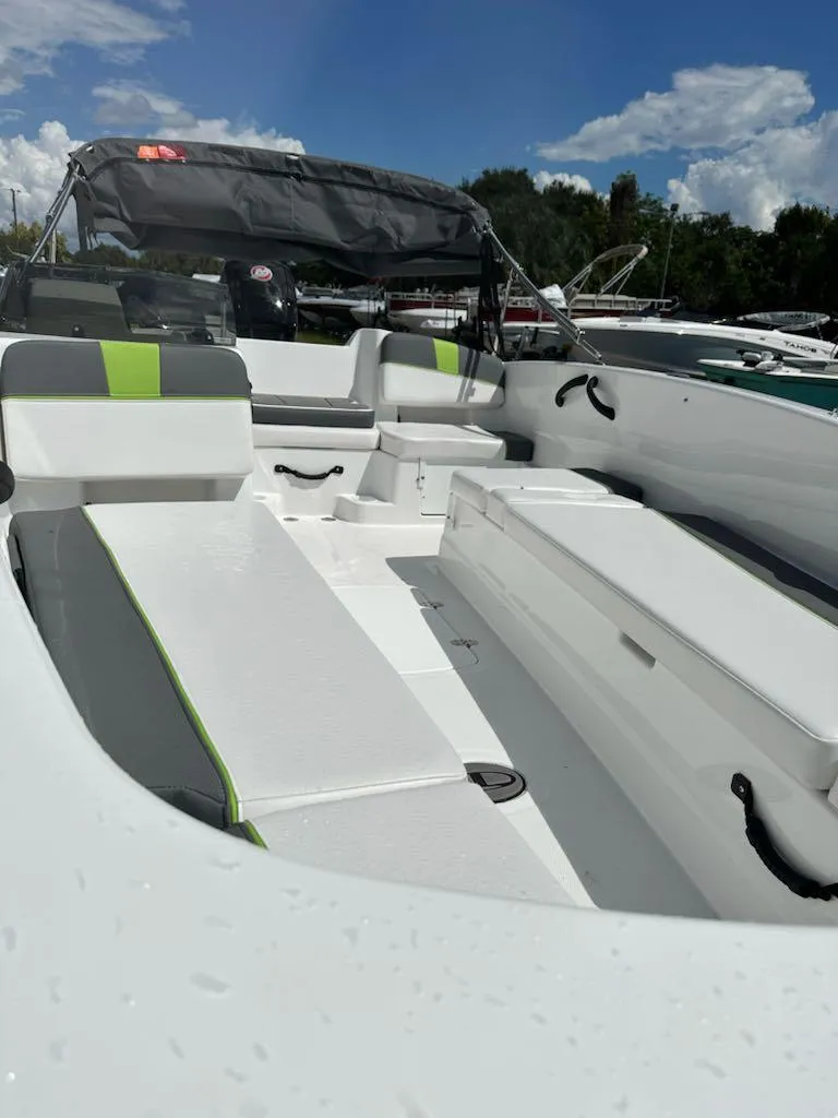 Slide: The Image of 2024 Tahoe T18 boat interior with sleek seating and modern design. - 5