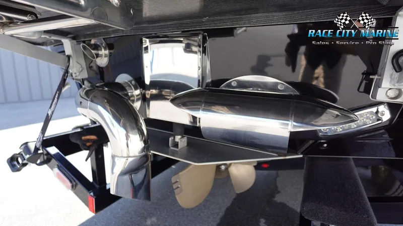 Slide: The Image of 2020 Nautique Super Air Nautique G23 boat propeller and exhaust system. - 10