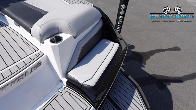 Slide: The Image of 2020 Nautique Super Air Nautique G23 boat interior with Race City Marine branding. - 13