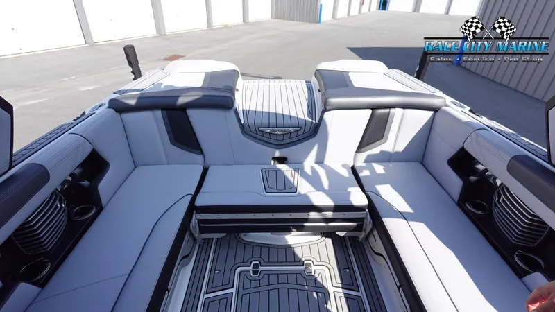 Slide: The Image of 2020 Nautique Super Air Nautique G23 interior with luxurious seating and modern design. - 17