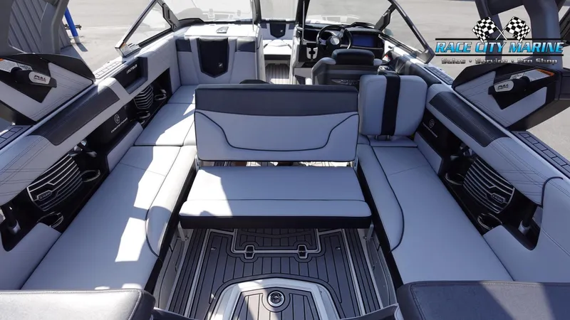 Slide: The Image of 2020 Nautique Super Air Nautique G23 interior with luxurious seating and modern design. - 22