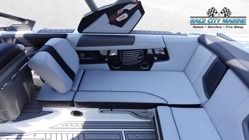 Slide: The Image of 2020 Nautique Super Air Nautique G23 interior with luxurious seating and modern design. - 23
