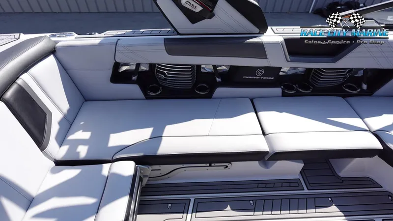 Slide: The Image of 2020 Nautique Super Air Nautique G23 interior with sleek seating and modern design. - 24