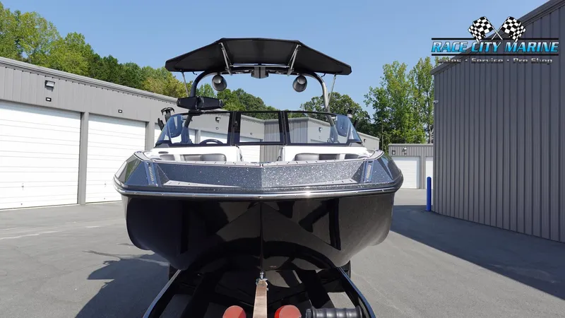Slide: The Image of 2020 Nautique Super Air Nautique G23 boat in storage facility. - 3