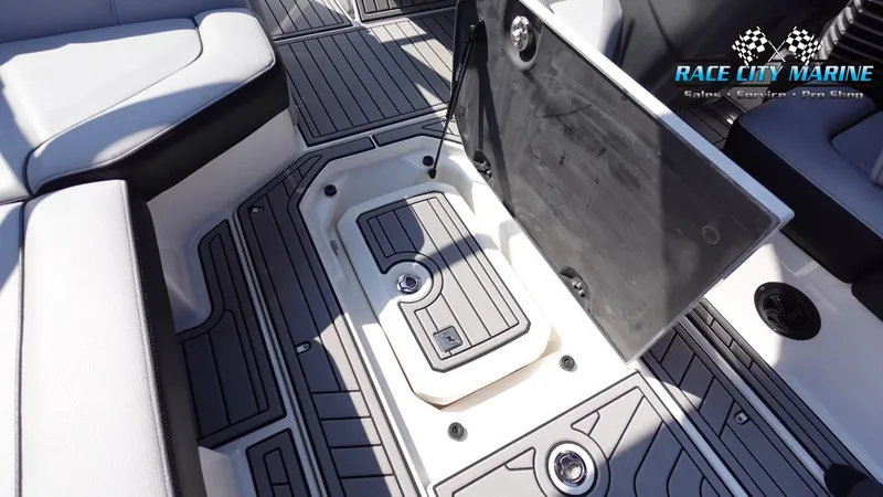 Slide: The Image of 2020 Nautique Super Air Nautique G23 interior with sleek seating and storage. - 31