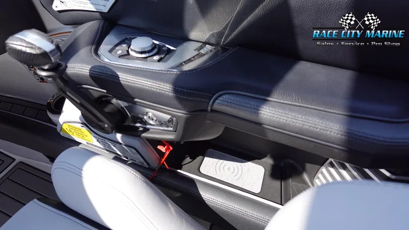 Slide: The Image of 2020 Nautique Super Air Nautique G23 interior controls and seating detail. - 34