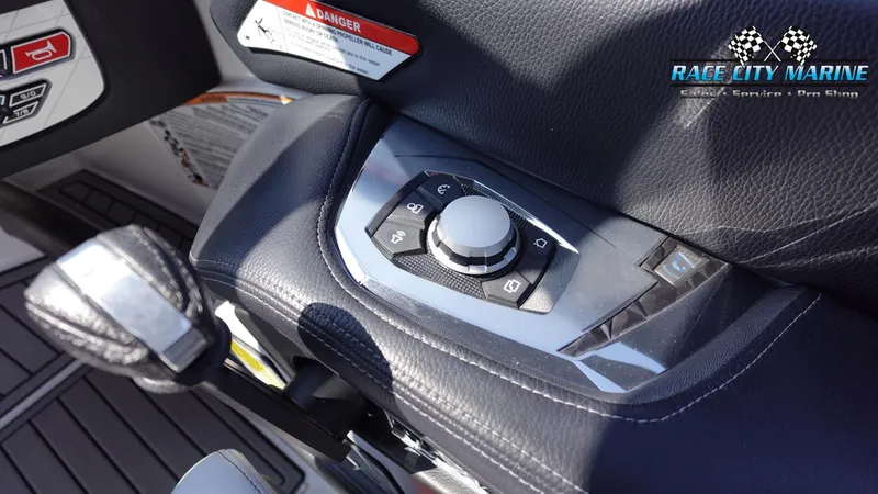Slide: The Image of 2020 Nautique Super Air Nautique G23 control panel with Race City Marine branding. - 35