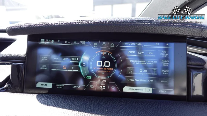 Slide: The Image of Dashboard display of 2020 Nautique Super Air Nautique G23 boat with digital controls. - 37