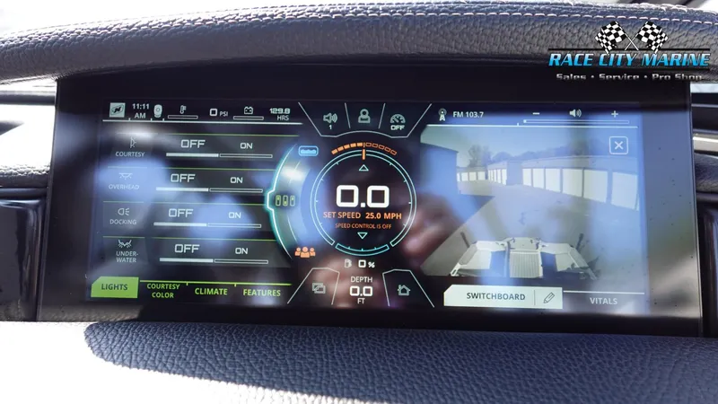 Slide: The Image of 2020 Nautique Super Air Nautique G23 dashboard display with speed and control settings. - 40