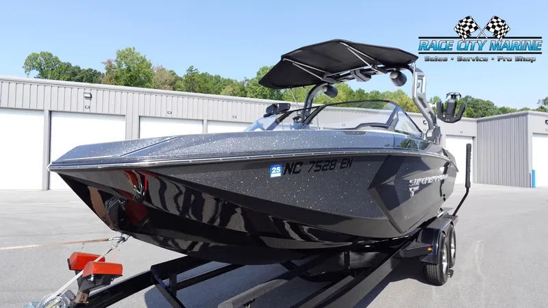 Slide: The Image of 2020 Nautique Super Air Nautique G23 boat on trailer at Race City Marine. - 6