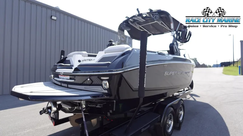 Slide: The Image of 2020 Nautique Super Air Nautique G23 boat on trailer, Race City Marine. - 8