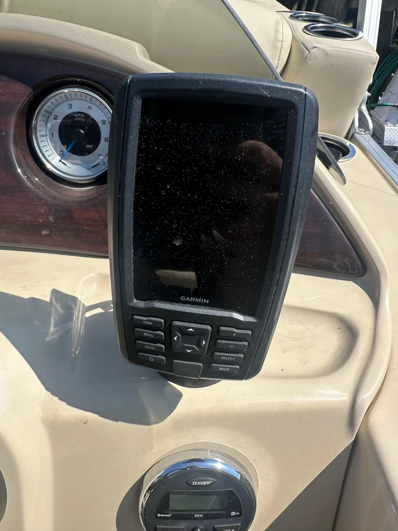 Slide: The Image of Garmin GPS on 2019 Sylvan Mirage 8522 LZ boat dashboard. - 8