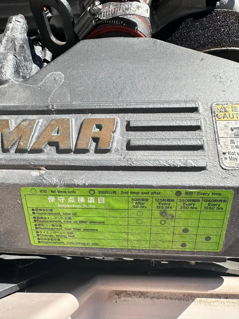 Slide: The Image of Close-up of a Yanmar engine in a 1999 Atlas Boat Works Acadia 25. - 17