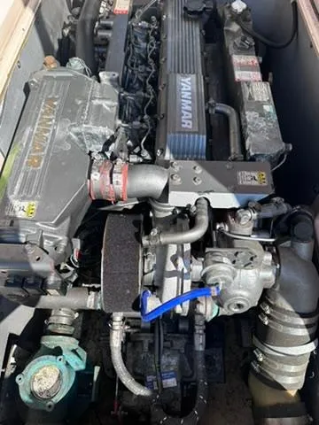 Slide: The Image of Engine of 1999 Atlas Boat Works Acadia 25 with Yanmar components. - 18