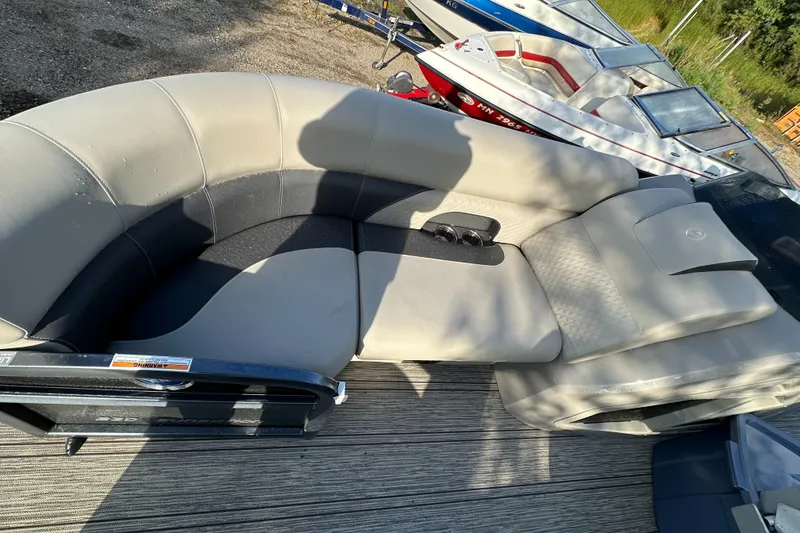 Slide: The Image of 2022 Premier 230 SunSation RF boat with spacious seating and modern design. - 4