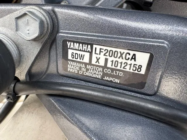 Slide: The Image of Yamaha LF200XCA engine label on 2023 Grady-White Fisherman 257 boat. - 10