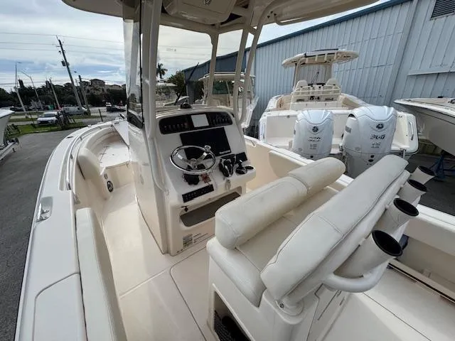 Slide: The Image of 2023 Grady-White Fisherman 257 boat interior with helm and seating area. - 14