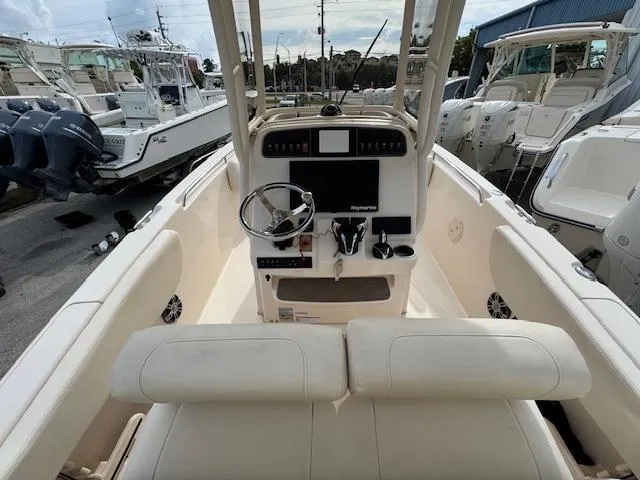 Slide: The Image of 2023 Grady-White Fisherman 257 boat interior with steering console and seating. - 17